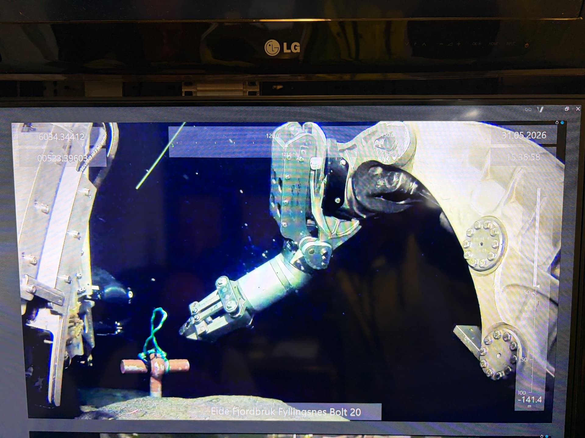 ROV manipulator installing an anchor bolt in drilled bedrock